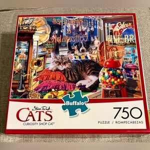 NEW Buffalo 750 Piece Puzzle -
Curiosity Shop Cat, By Steve Read,
18" X 24"